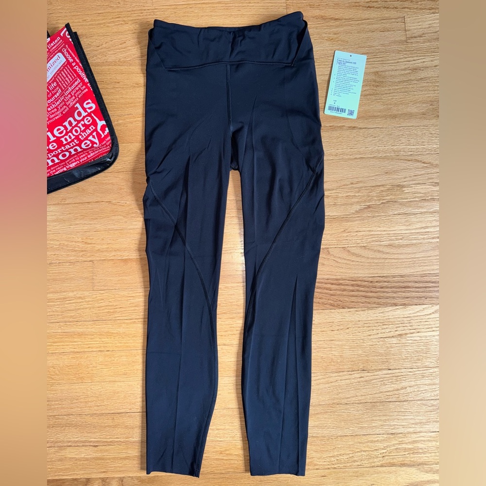 Lululemon Free to Speed High-Rise Tight 25” black size 4- perfect condition